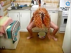 Hot redhead pissing into a bowl in the kitchen Part 4
