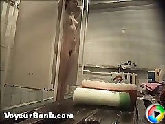 Young slim doll getting spied after in the showers Part 1